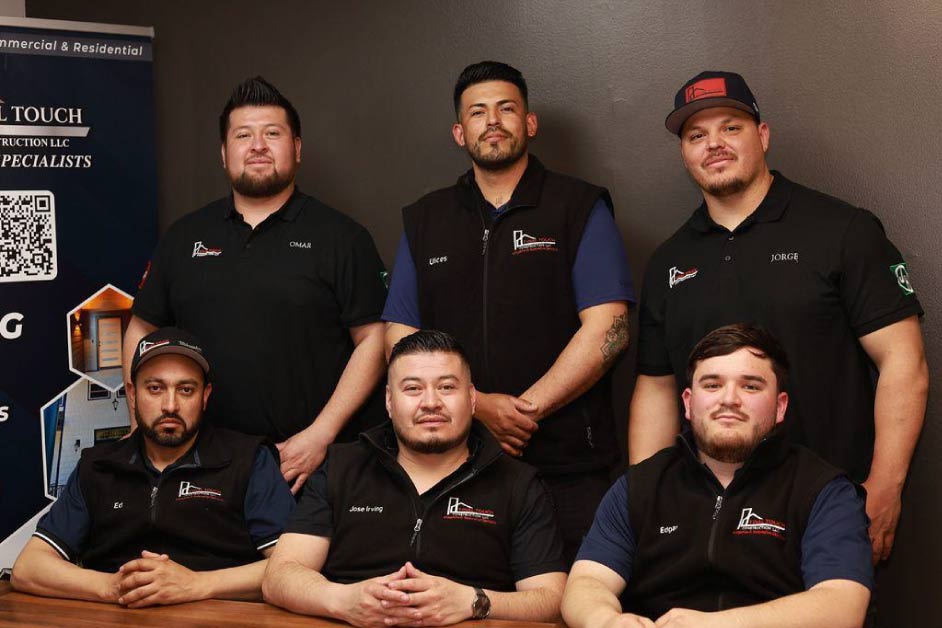 members-of-final-touch Final Touch Construction LLC leadership team of six — including Omar, Ulces, Jorge, Edgar, Jose Irving, and Edgar — posed for a professional portrait in branded black vests at the company's Washington office