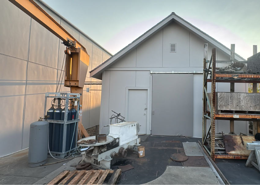 Modern multi-family & commercial construction site in Tukwila featuring high-volume siding installation on a three-story apartment building by Final Touch Construction.