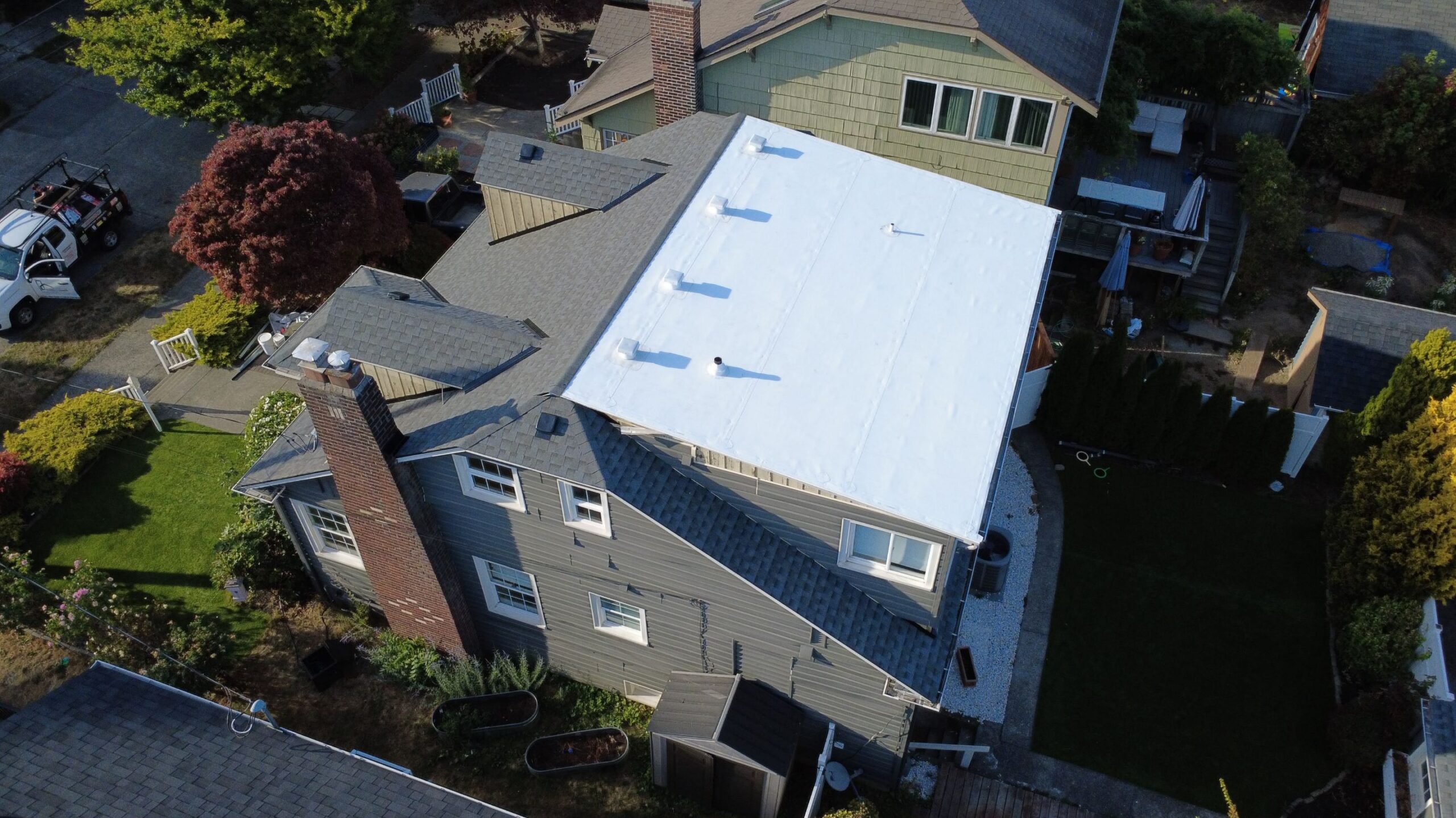 Aerial view of a recently completed roof coating